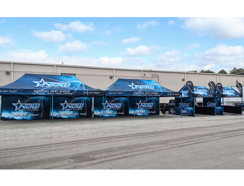 Four printed gazebos set-up side by side