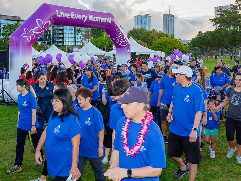 Freestanding Inflatable Arch Group of walkers with freestanding inflatable arch in background