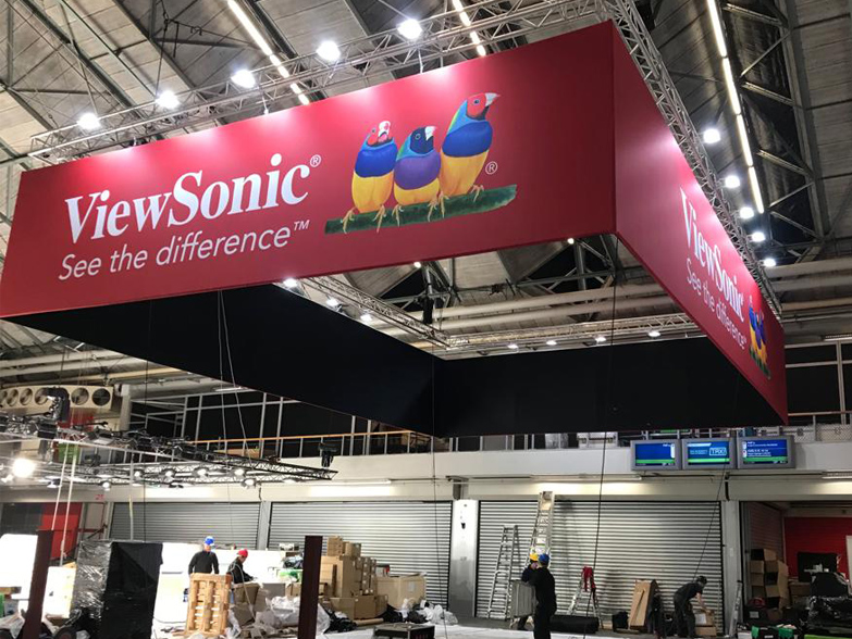 Large printed Hanging Banner being lifted into event space