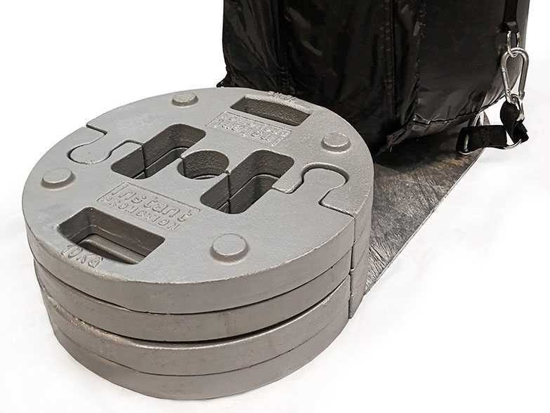 X1 Weight Securing Plate Four 20kg weight plates on a spider dome X1 weight securing plate