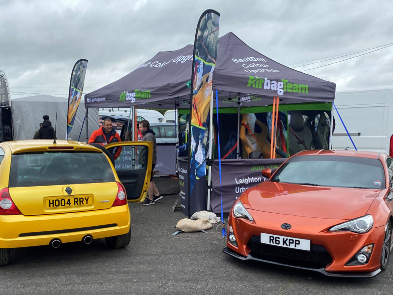 3x6m Printed Gazebo and Flags with two motor cars