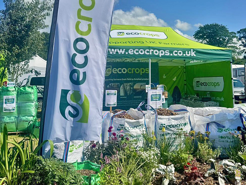 Eco Crops branded gazebo and eco-friendly product stand at UK agricultural show